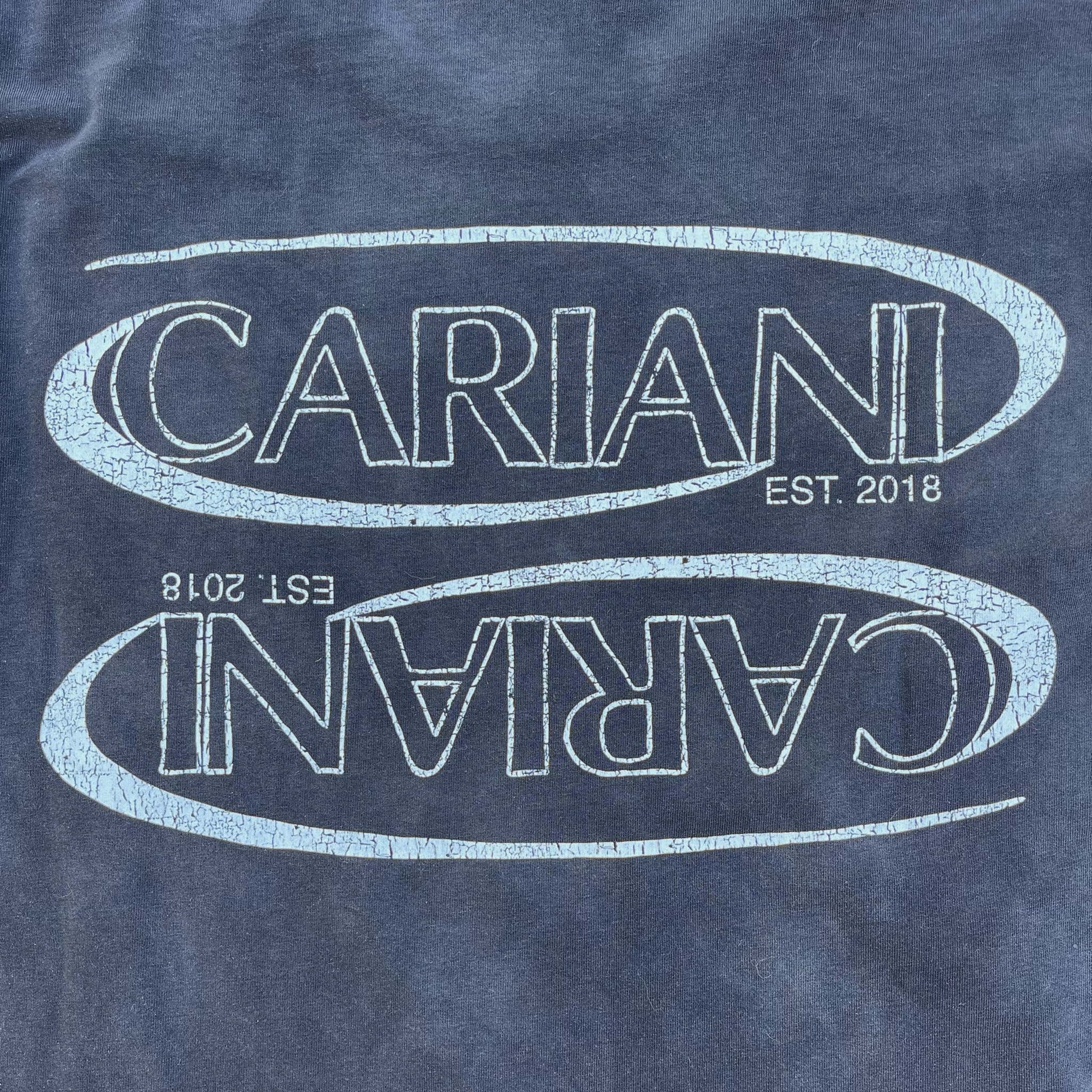 CARIANI® Cracked Oval Logo Tee